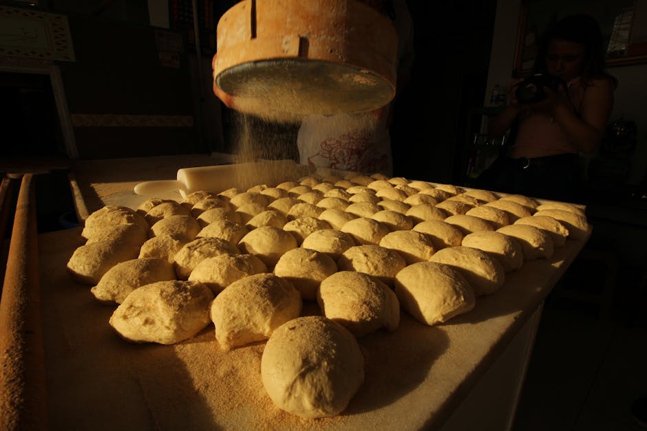 Baker working with dough
