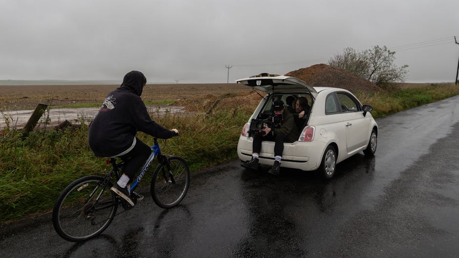 Documentary film crew capturing race action