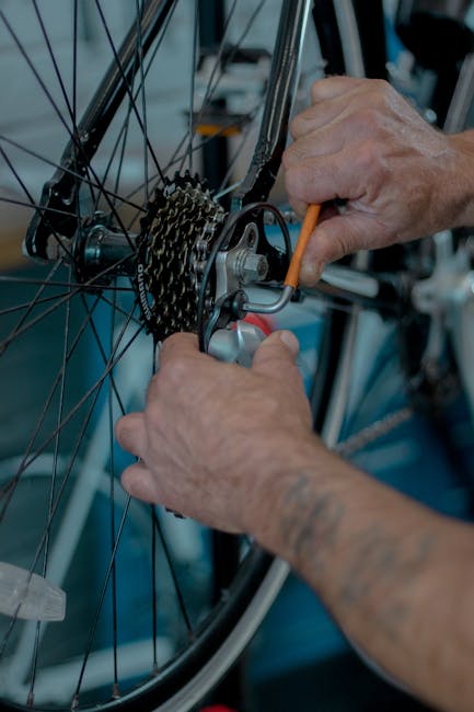 Race mechanics working on bikes
